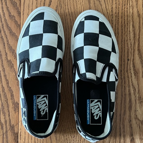 Vans Shoes - 💚 Vans | Size 8.5 Womens. Black & Off White Checkerboard Slip-Ons.